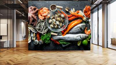 Variety of fresh seafood with herbs and lime. Wall mural