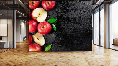 Whole and pieces of red apple with leaves.  Wall mural