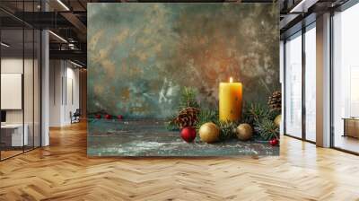 Warm glow from a solitary candle casts soft light on a richly decorated holiday table background with empty space for text Wall mural