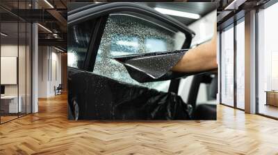 Car window tinting series: Installation of car window tinting. Detailing studio. Wall mural