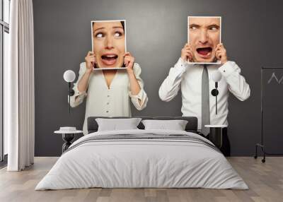 man and woman holding amazed shouting faces Wall mural