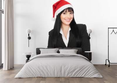 smiley businesswoman with red santa hat Wall mural