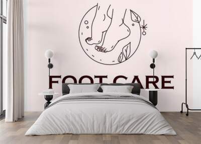 Foot care logo design with pair of bare woman feet arranged together and some decorative elements isolated on light background. Foot icon. Vector line art illustration. Wall mural