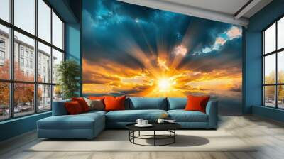 A close-up of a sunset with sun rays streaming through a small gap in the clouds, creating a dramatic and inspiring scene with vibrant colors in the sky. Wall mural