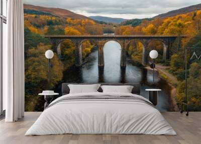 A railway bridge over a river with a clear, expansive landscape background. The unobstructed space around the bridge provides room for text placement. Wall mural