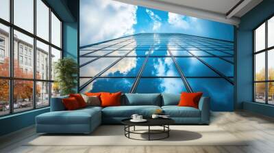 A towering skyscraper in a cityscape with a large empty sky providing ample copy space. Wall mural