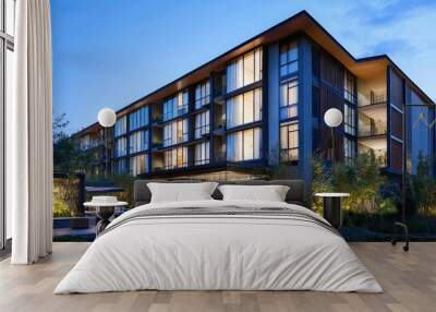 Contemporary hotel building with a sleek design and large glass windows. Wall mural