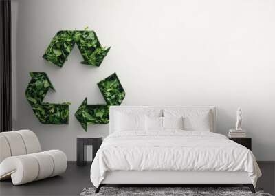 Minimalist design featuring the iconic green recycle symbol on a white background, with generous copy space to convey messages about eco-friendliness and responsible waste management. Wall mural