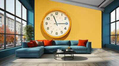 clock on a yellow wall Wall mural