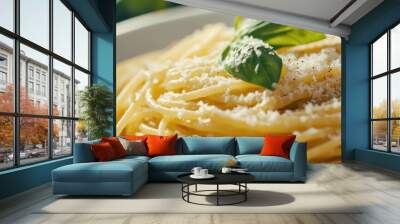 Delicious traditional Italian pasta topped with grated Parmesan cheese and fresh basil Wall mural