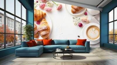 Fresh croissants coffee milk jam and flowers on white background Wall mural