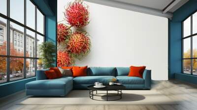 Rambutan on a clean white surface Wall mural