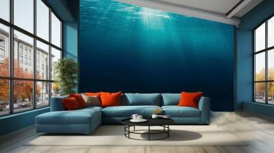 underwater front view of blue water ocean with natural sun light Wall mural