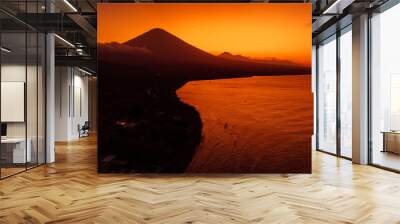 Panoramic view of coastline with volcano and sunset with quiet ocean in Bali. Wall mural