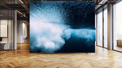 Underwater wave with foam. Blue powerful wave in ocean. Wall mural