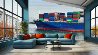 Aerial view of container cargo ship at sea. International shipping and logistics. Maritime freight transportation. Global trade and export import industry. Commercial vessel carrying containers. Wall mural