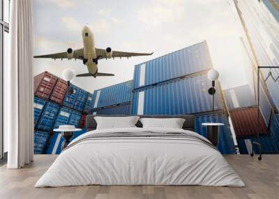 Air logistics. Cargo airplane flying above stack of logistic container. Cargo and shipping business. Container ship for export logistic. Logistic industry from port to port. Freight transportation. Wall mural