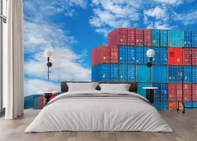 Red and blue logistic container against blue sky. Cargo and shipping business. Container ship for import and export logistics. Logistic industry. Container for truck transport and air logistic. Wall mural