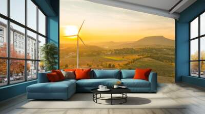 Wind farm field and sunset sky. Wind power. Sustainable, renewable energy. Wind turbines generate electricity. Sustainable development. Green technology for energy sustainability. Eco-friendly energy. Wall mural