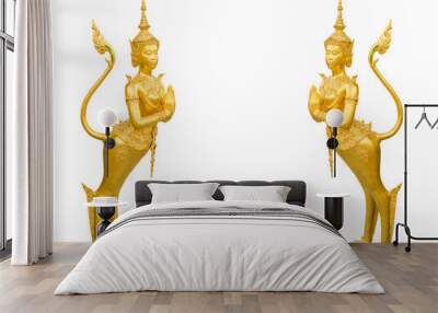 Beautiful gold Kinnara statues, guardian of Thai temple at Buddhist sanctuary isolated white background (clipping path included) Wall mural