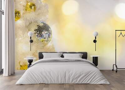 Christmas white tree with gold silver balls ornament and blur light bokeh background for text decoration, insertion or xmas promotion product design display in special occasion or 2018 new year season Wall mural