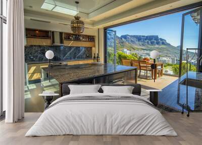 A contemporary Cape Town kitchen, with South African granite surfaces, a central island for wine tastings, and floor-to-ceiling sliding doors that showcase Table Mountain and the city bowl. Wall mural