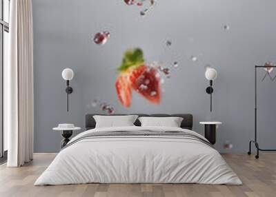 Falling strawberry isolated on white background full depth of field Wall mural