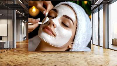 A serene beauty treatment with a woman enjoying a facial mask. Relaxation and skincare in a soothing environment with gentle lighting. Wall mural