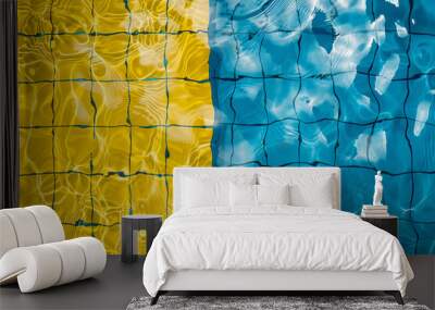 A swimming pool with blue and yellow tiles reflecting sunlight, presenting a vibrant and inviting recreational setting. Wall mural