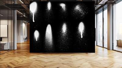 Realistic grunge graffiti spray paint effect on the black background. Isolated white ink texture. Wall mural