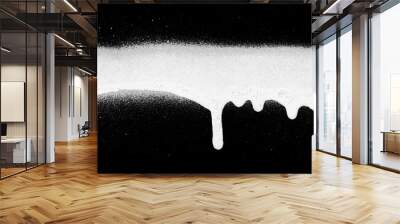 Realistic grunge graffiti spray paint effect on the black background. Isolated white ink texture. Wall mural