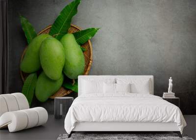 fresh green mango on dark backgroud Wall mural