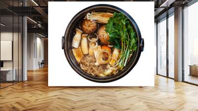 Isolated top view of Sukiyaki hot pot with boiling vegetables including cabbage, konjac noodle, onion, carrot, shiitake, enokitake and tofu in Shoyu sauce soup. Wall mural