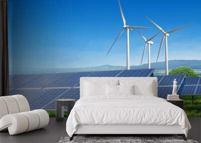 solar panels and wind turbines under blue sky Wall mural