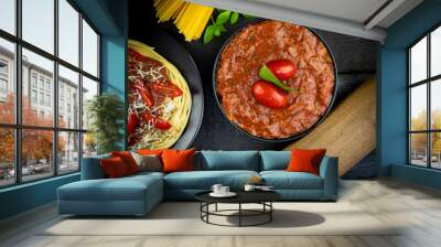 Tomato sauce and Italian spaghetti  with parmesan cheese and basil served on the plate Wall mural