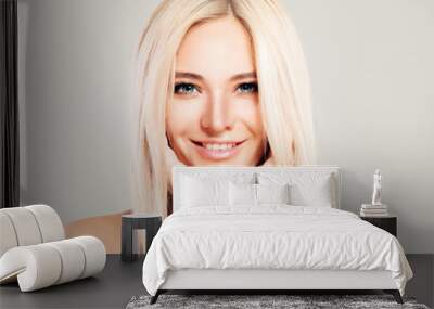 Cute Blonde Woman Fashion Model with Blonde Hair Smiling. Beautiful Girl, Pretty Face Wall mural