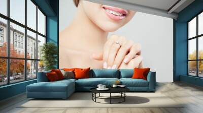 Diamond ring on female hand. Jewelry model closeup Wall mural