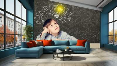 Idea! Smart kid student with lightbulb on blackboard Wall mural