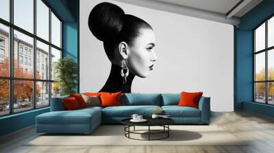 retro style black and white fashion portrait of elegant female model with hair bun hairstyle and eye Wall mural