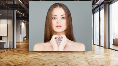 Young Healthy Woman with Ice Cubes. Beautiful Model Girl, Spa an Wall mural