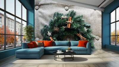 Christmas wreath with decoration  cinnamon on grey Wall mural