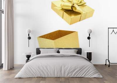 Gold gift box with bow open. Wall mural