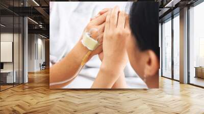 daughter praying for her mother health in hospital Wall mural