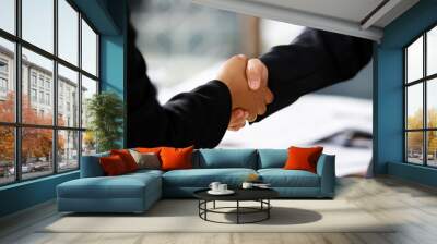 handshake between two businesswomen Wall mural