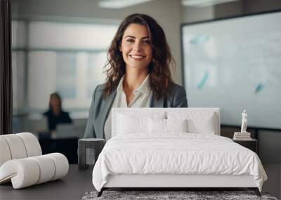 Female employee or supervisor inside office giving a business presentation in front of whiteboard Wall mural