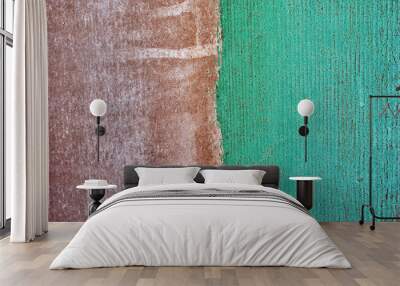 Wall with brown and bright green turquoise shabby paint on white background, stripe divide on two halves, grunge texture background Wall mural