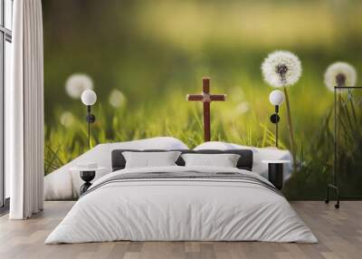 Dandelion flower and dandelion spore in a meadow on a fresh spring day, the Holy Cross of Jesus Christ and the Holy Bible
 Wall mural