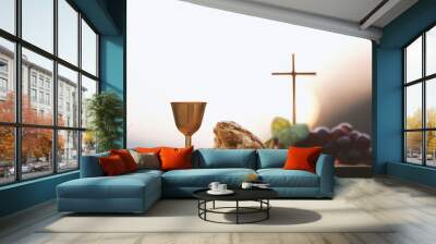 Holy Communion, which symbolizes the holy blood and flesh of Jesus Christ. The Last Supper. Bread, wine, the Bible, the Holy Grail, and the cross. The background of the Lent Passion Week. Easter conce Wall mural