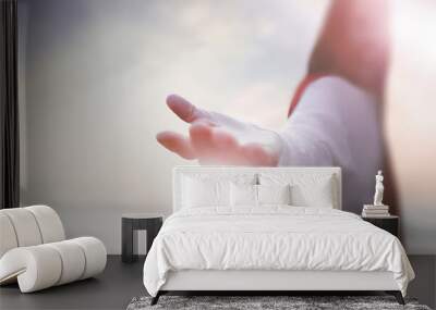 Resurrected Jesus Christ reaching out with open arms in the sky, heaven and cross, love and salvation concept
 Wall mural