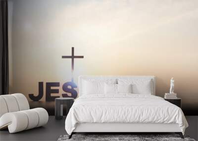 The brightly rising New Year's sunrise and the holy cross of Jesus Christ and JESUS
 Wall mural